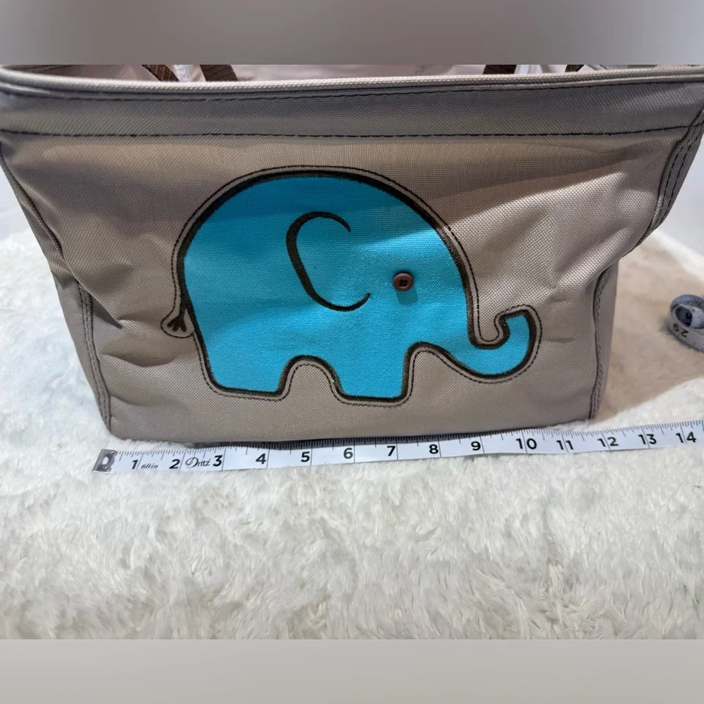 thirty-one small square beige colored tote with brown handles & blue elephant